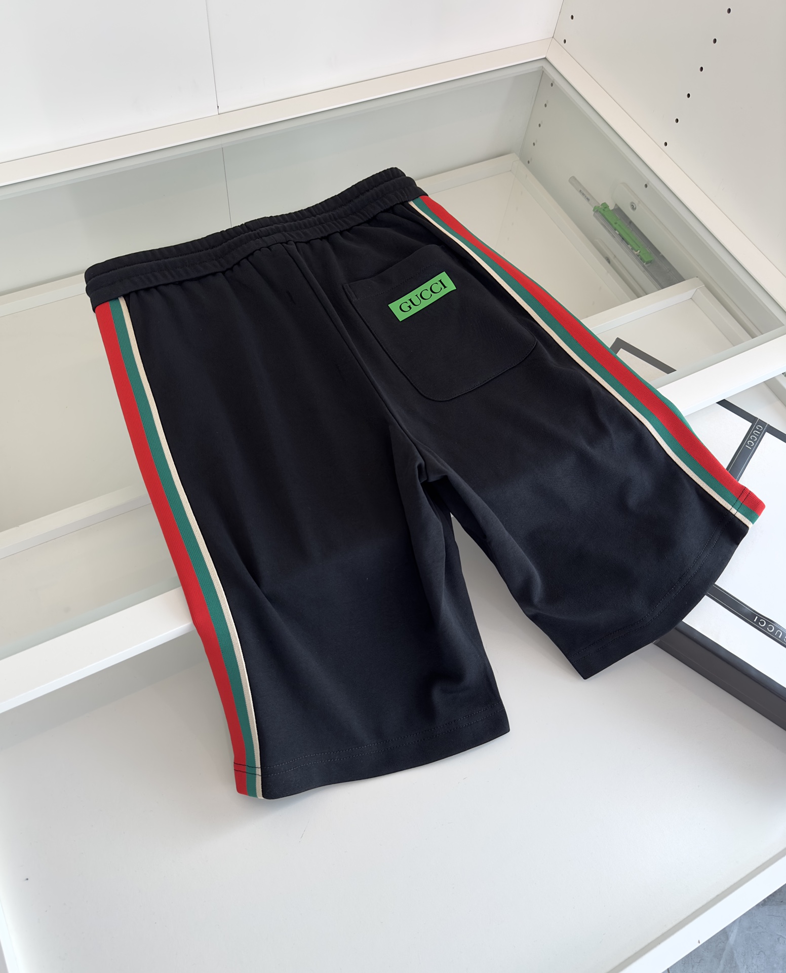 Replica Gucci red and green webbed shorts on both sides