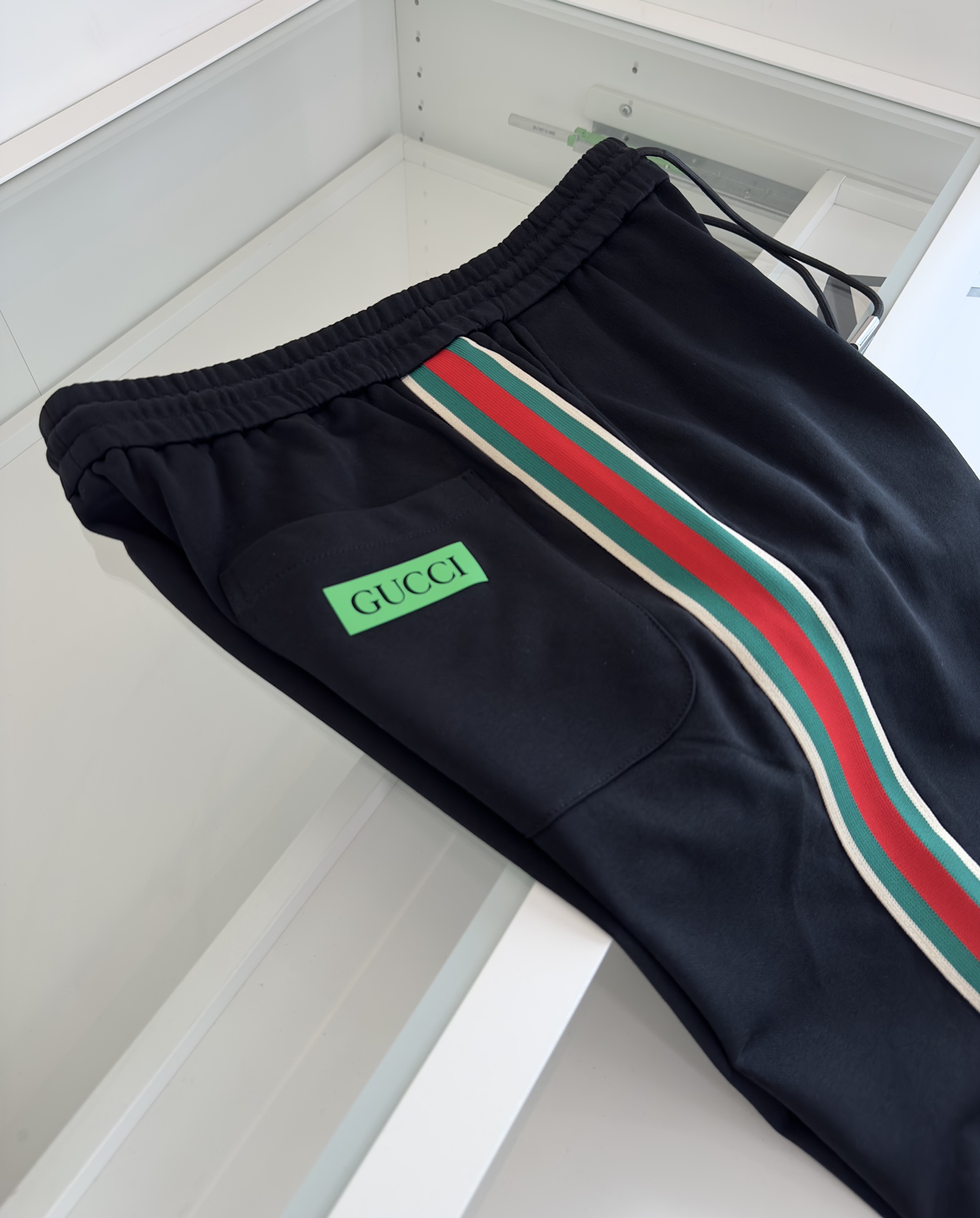 Replica Gucci red and green webbed shorts on both sides