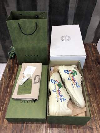 Replica Gucci Ladies Rhyton Ivory Leather Logo Sneakers