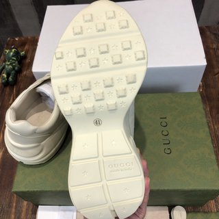 Replica Gucci Ladies Rhyton Ivory Leather Logo Sneakers