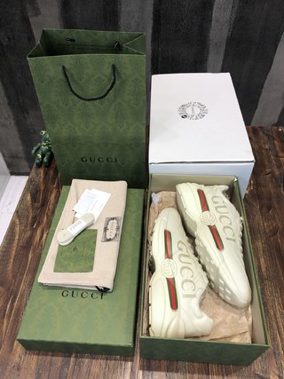 Replica GUCCI Women's Rhyton Gucci Logo Leather Sneaker